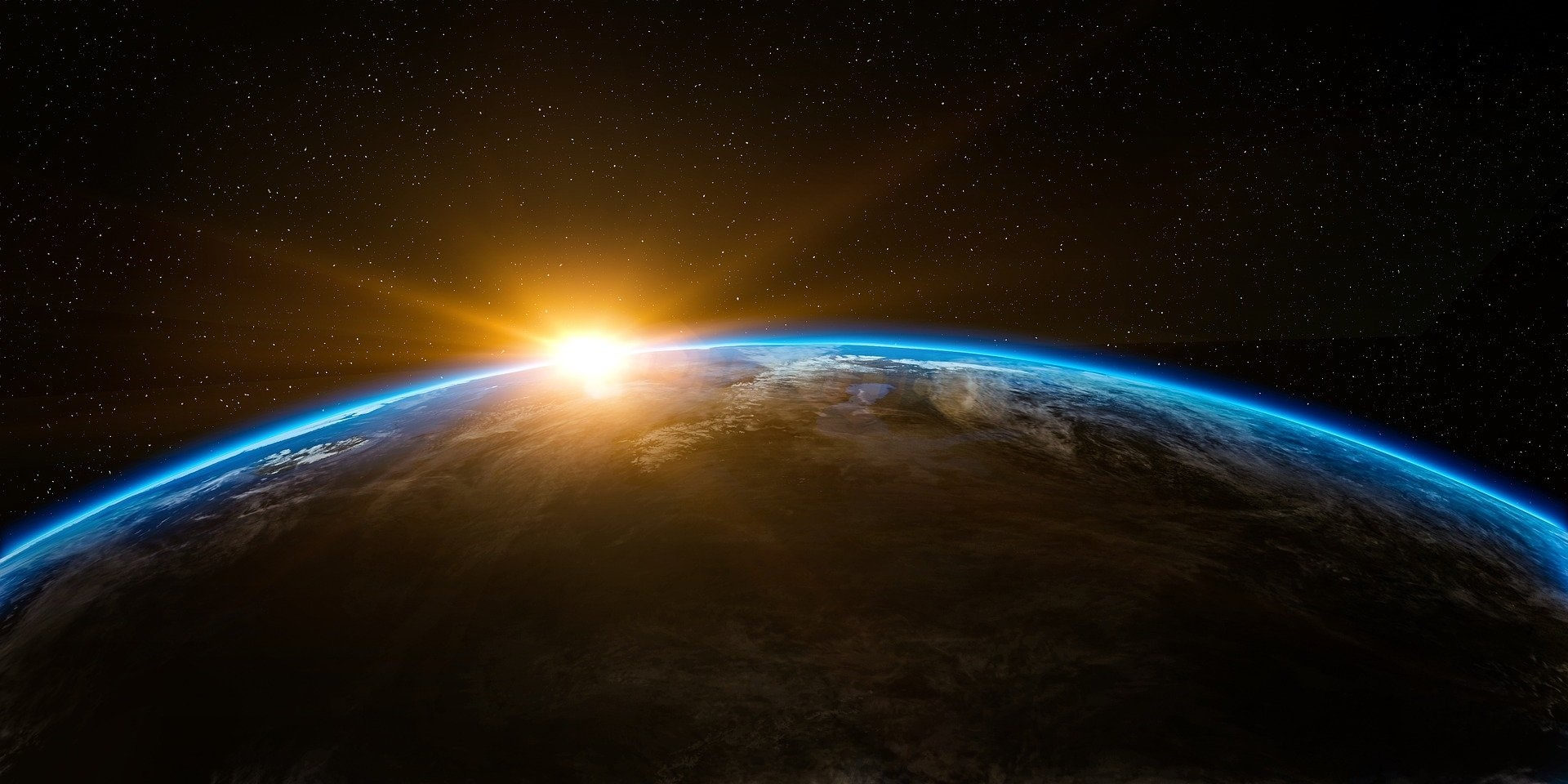 Sunrise over the curve of the Earth, seen from space